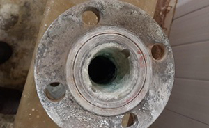 A flange that has been attached by a chemical medium